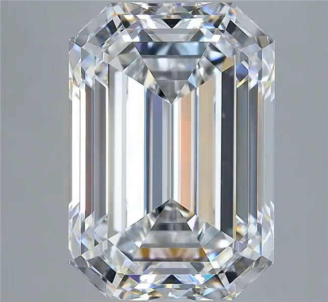 A close view of a natural diamond, showing its facets and light