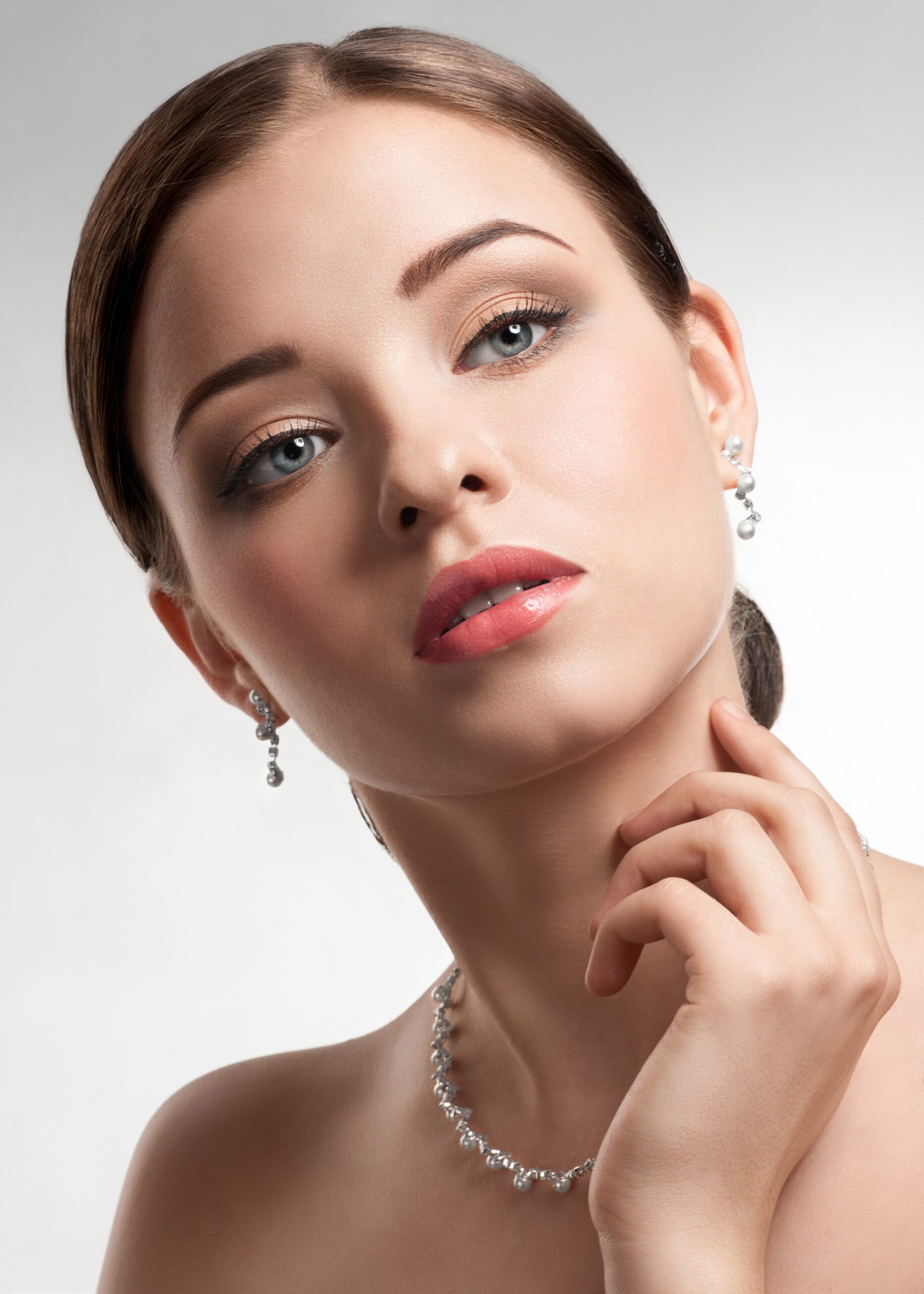 Beautiful Woman with Pearl Necklace